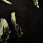 Must heleroheliste vahetükkidega dressipluus - Image 2